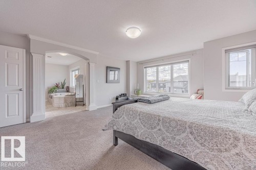 1019 Coopers Hawk Link, Edmonton, AB - Indoor Photo Showing Bedroom
