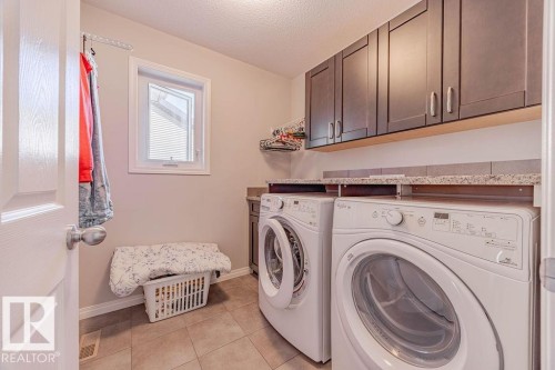 1019 Coopers Hawk Link, Edmonton, AB - Indoor Photo Showing Laundry Room