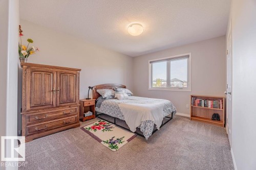 1019 Coopers Hawk Link, Edmonton, AB - Indoor Photo Showing Bedroom