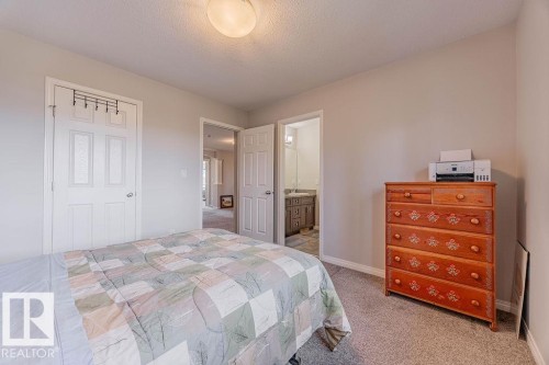 1019 Coopers Hawk Link, Edmonton, AB - Indoor Photo Showing Bedroom