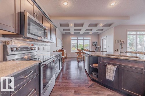 1019 Coopers Hawk Link, Edmonton, AB - Indoor Photo Showing Kitchen With Upgraded Kitchen