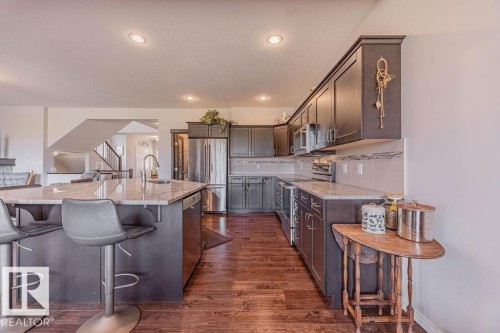 1019 Coopers Hawk Link, Edmonton, AB - Indoor Photo Showing Kitchen With Upgraded Kitchen