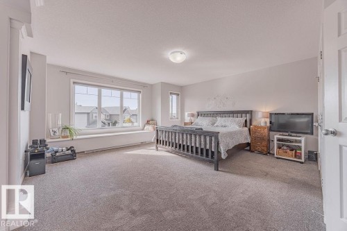 1019 Coopers Hawk Link, Edmonton, AB - Indoor Photo Showing Bedroom