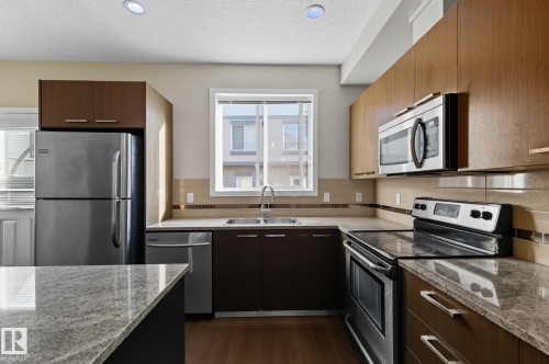 #29 655 Watt Boulevard Sw, Edmonton, AB - Indoor Photo Showing Kitchen With Double Sink