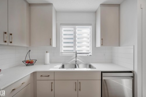 19 525 Secord Boulevard, Edmonton, AB - Indoor Photo Showing Kitchen With Double Sink
