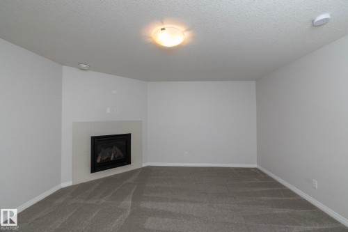 197 Birchwood Close, Devon, AB - Indoor With Fireplace