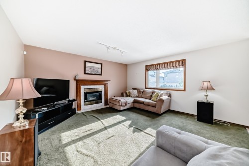15815 63 Street, Edmonton, AB - Indoor Photo Showing Living Room With Fireplace