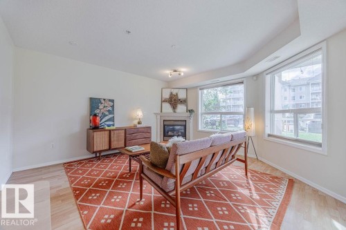 102 9008 99 Avenue, Edmonton, AB - Indoor With Fireplace