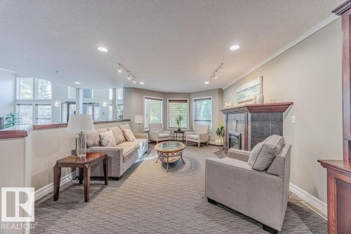 102 9008 99 Avenue, Edmonton, AB - Indoor Photo Showing Living Room