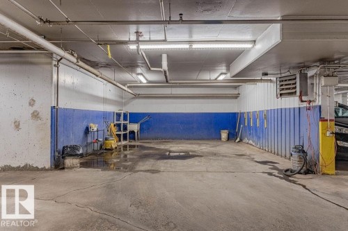 102 9008 99 Avenue, Edmonton, AB - Indoor Photo Showing Garage
