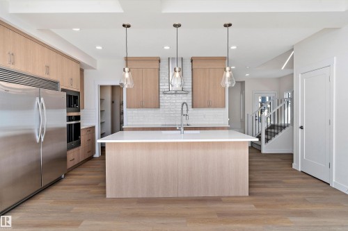 7181 177A Ave, Edmonton, AB - Indoor Photo Showing Kitchen With Double Sink With Upgraded Kitchen