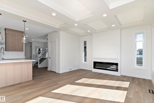 7181 177A Ave, Edmonton, AB - Indoor Photo Showing Living Room With Fireplace