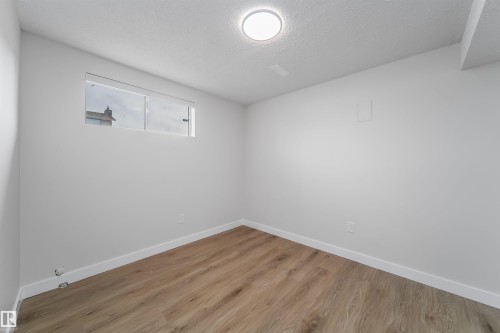 7115 12 Avenue, Edmonton, AB - Indoor Photo Showing Other Room