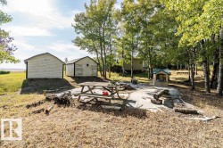 View of yard with a storage unit - 
