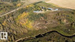 View of property location featuring rural landscape and a forest - 