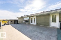 Back of property featuring a patio and french doors - 