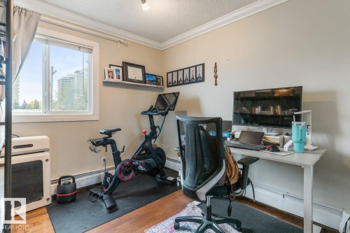 410 10139 117 Street, Edmonton, AB - Indoor Photo Showing Gym Room