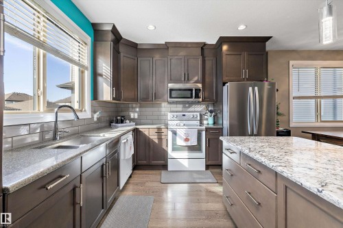 135 Gilmore Way, Spruce Grove, AB - Indoor Photo Showing Kitchen With Double Sink With Upgraded Kitchen