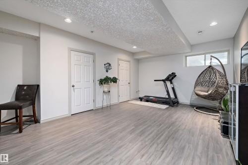135 Gilmore Way, Spruce Grove, AB - Indoor Photo Showing Gym Room