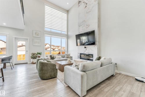 2404 13 Avenue, Edmonton, AB - Indoor Photo Showing Living Room With Fireplace