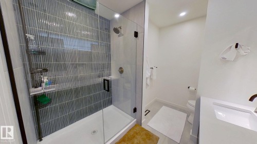 Bathroom with a stall shower, vanity, and recessed lighting - 11308 128 Street, Edmonton, AB - Indoor Photo Showing Bathroom