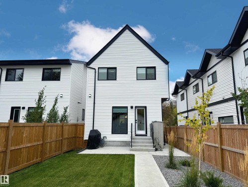 Back of property with a fenced backyard and a patio - 11308 128 Street, Edmonton, AB - Outdoor