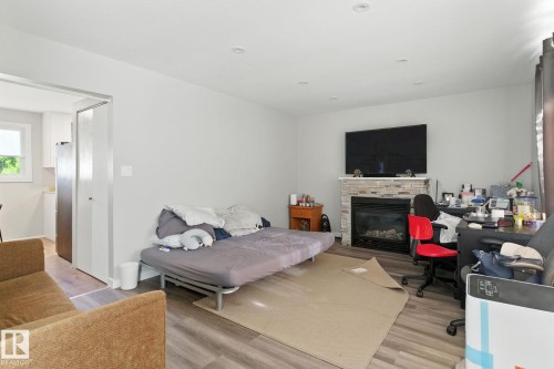10505 154 Street, Edmonton, AB - Indoor Photo Showing Living Room With Fireplace