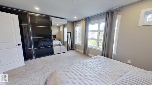 Bedroom with light carpet and recessed lighting - 8809 148 Street, Edmonton, AB - Indoor Photo Showing Bedroom