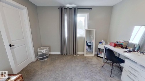 Office space featuring light colored carpet and baseboards - 8809 148 Street, Edmonton, AB - Indoor Photo Showing Office