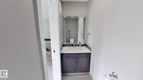 Bathroom with vanity and toilet - 8809 148 Street, Edmonton, AB - Indoor Photo Showing Bathroom