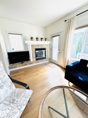 14418 98 Street, Edmonton, AB - Indoor Photo Showing Living Room With Fireplace