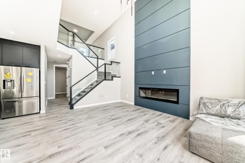 6819 171 Avenue, Edmonton, AB - Indoor Photo Showing Other Room With Fireplace