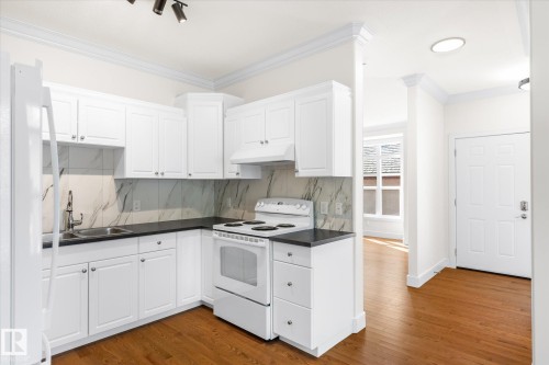 9306 91 Street, Edmonton, AB - Indoor Photo Showing Kitchen With Double Sink