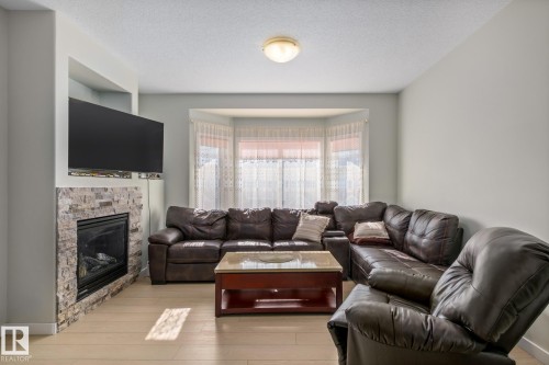 33 13215 153 Avenue, Edmonton, AB - Indoor Photo Showing Living Room With Fireplace