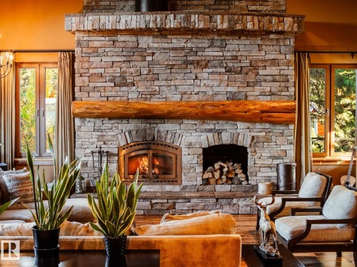 3 Eagle Drive, Rural Bonnyville M.D., AB - Indoor Photo Showing Living Room With Fireplace
