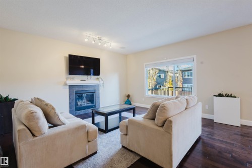 2122 Ware Road, Edmonton, AB - Indoor Photo Showing Living Room With Fireplace
