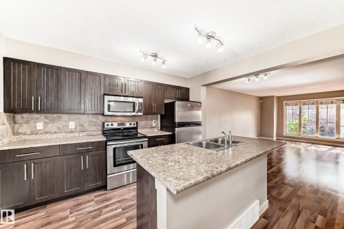3834 Allan Drive, Edmonton, AB - Indoor Photo Showing Kitchen With Double Sink