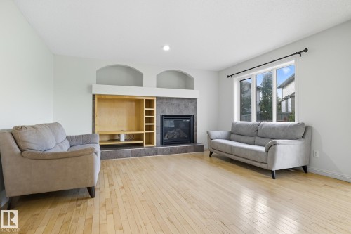 548 Adams Way, Edmonton, AB - Indoor Photo Showing Living Room With Fireplace