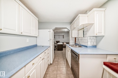 11951 77 Street Nw, Edmonton, AB - Indoor Photo Showing Kitchen With Double Sink