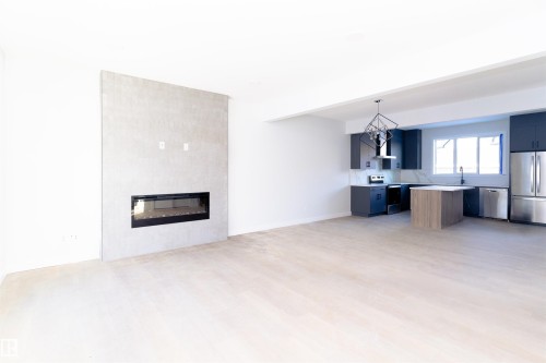 5113 Pilot Lane, Edmonton, AB - Indoor Photo Showing Other Room With Fireplace