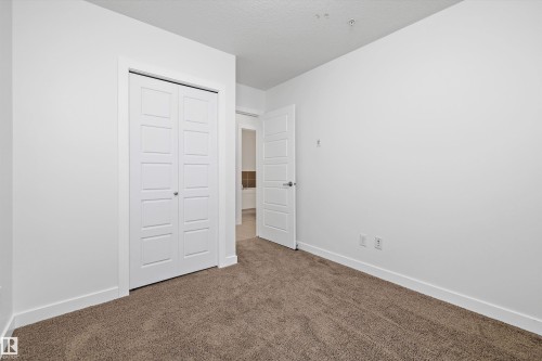 108 2590 Anderson Way, Edmonton, AB - Indoor Photo Showing Other Room