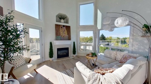 508 7839 96 Street, Edmonton, AB - Indoor Photo Showing Living Room With Fireplace