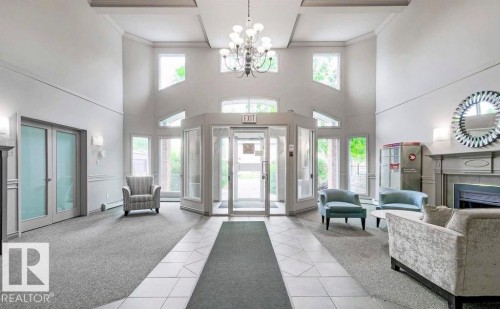 508 7839 96 Street, Edmonton, AB - Indoor Photo Showing Other Room With Fireplace