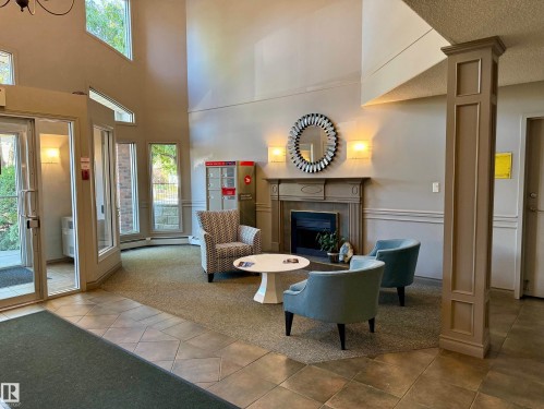 508 7839 96 Street, Edmonton, AB - Indoor Photo Showing Other Room With Fireplace