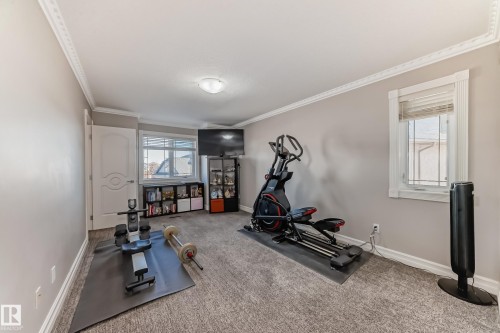 Edmonton, AB - Indoor Photo Showing Gym Room