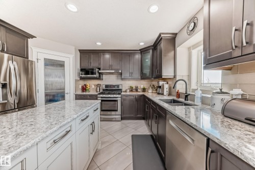 Edmonton, AB - Indoor Photo Showing Kitchen With Stainless Steel Kitchen With Double Sink With Upgraded Kitchen
