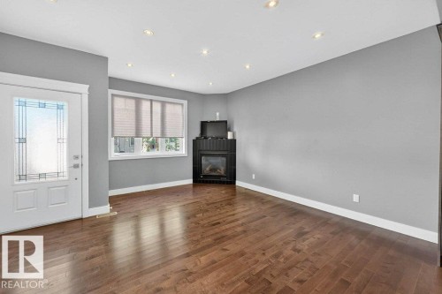 7909 105 Avenue Nw, Edmonton, AB - Indoor With Fireplace