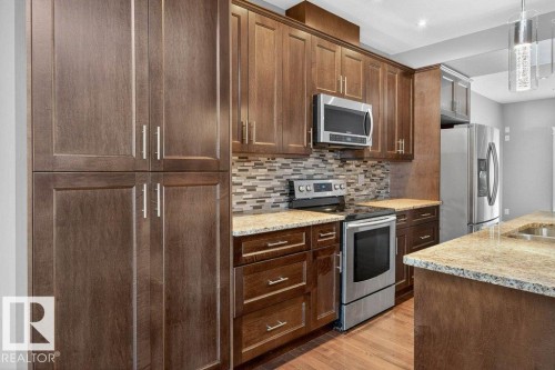 7909 105 Avenue Nw, Edmonton, AB - Indoor Photo Showing Kitchen With Double Sink With Upgraded Kitchen