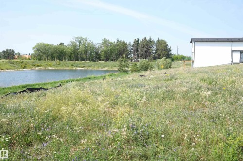 View of yard with a water view - 9227 156 Avenue, Edmonton, AB 