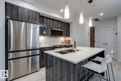 206 11969 Jasper Avenue, Edmonton, AB - Indoor Photo Showing Kitchen With Double Sink With Upgraded Kitchen
